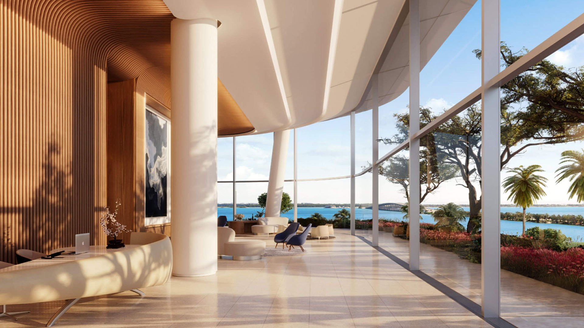 Una Residences Brickell, Miami grand lobby reception with sculptural curved architecture, wood accents and floor-to-ceiling glass overlooking waterfront, setting the tone for luxury and ultra luxury preconstruction condos.