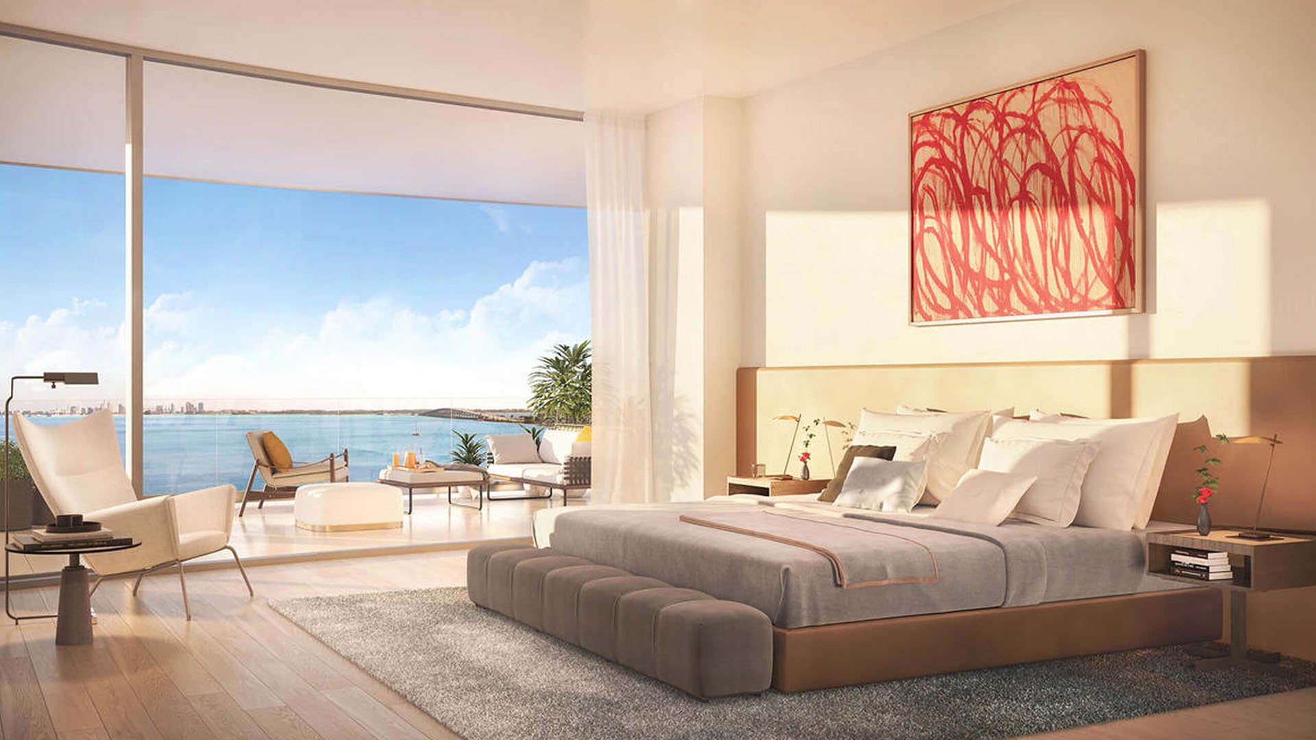 Una Residences Brickell, Miami primary bedroom suite with plush bed, art wall and private terrace facing Biscayne Bay, highlighting luxury and ultra luxury preconstruction condos with sunrise-ready waterfront views.
