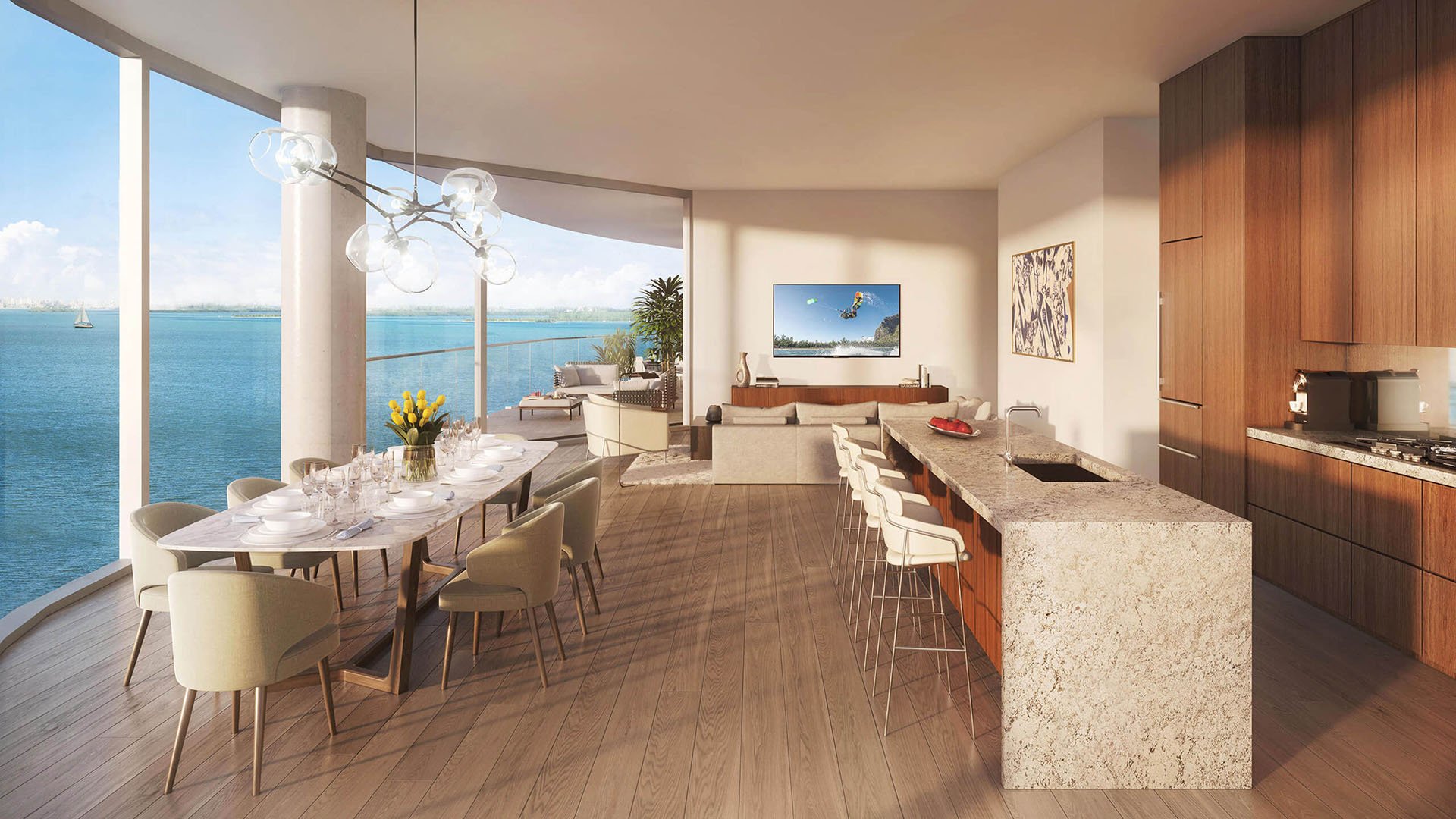 Una Residences Brickell, Miami open-concept great room with dining table, gourmet kitchen island and bay-view terrace, featuring luxury and ultra luxury preconstruction condos with expansive floor plans and waterfront vistas.