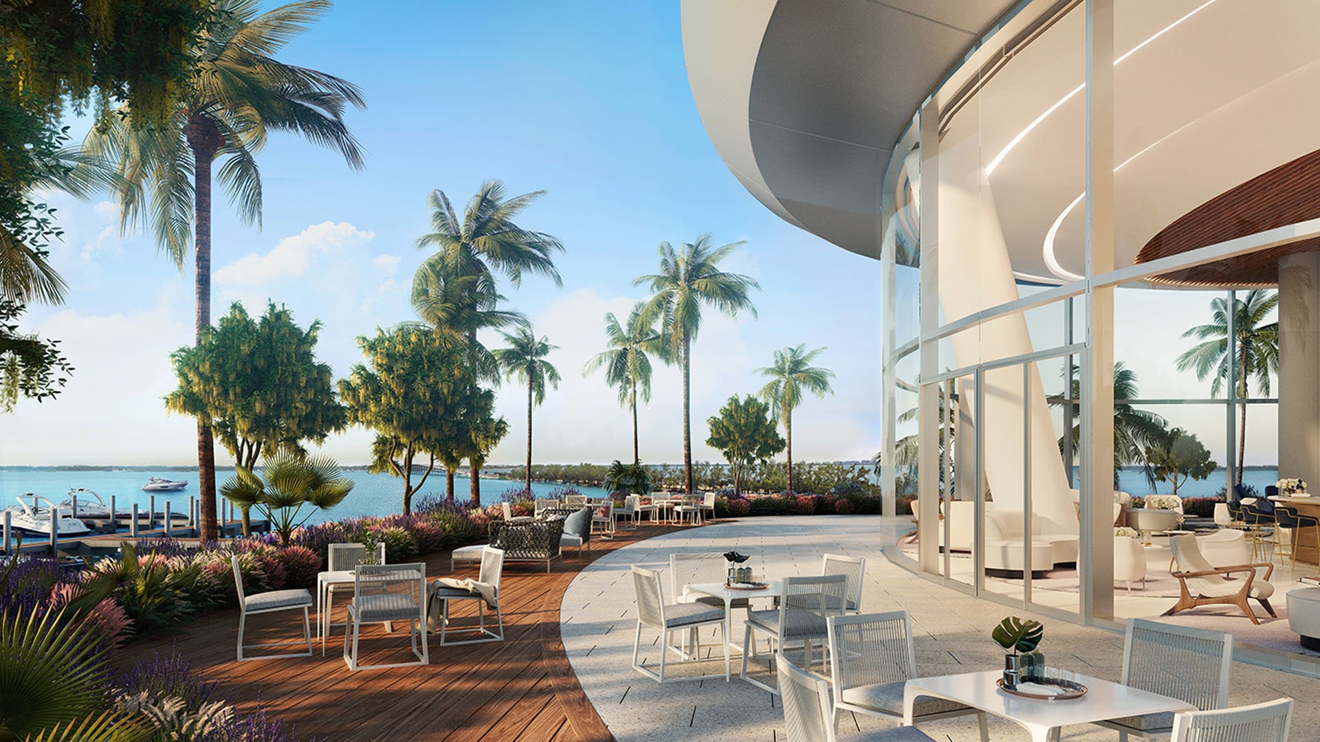 Una Residences Brickell, Miami residents lounge terrace with outdoor dining, palm-lined patio and waterfront views near the marina, showcasing luxury and ultra luxury preconstruction condos lifestyle in Brickell.
