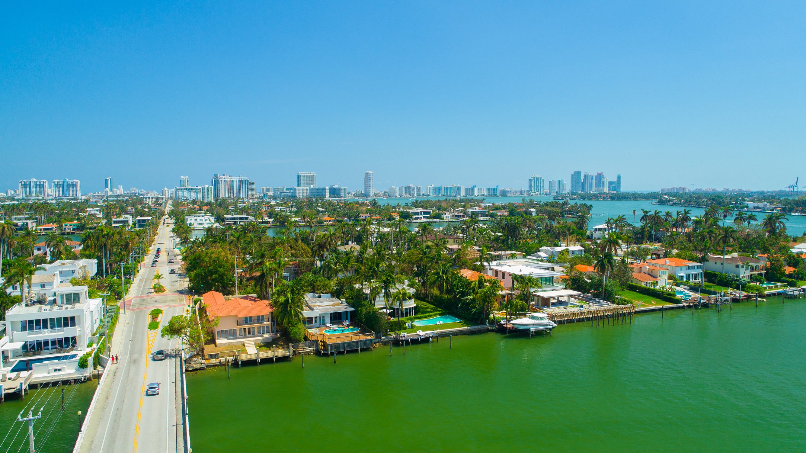 Venetian Islands, Miami waterfront homes and yachts, elite neighborhood adjacent to luxury and ultra luxury condos. Featuring island and coastal.