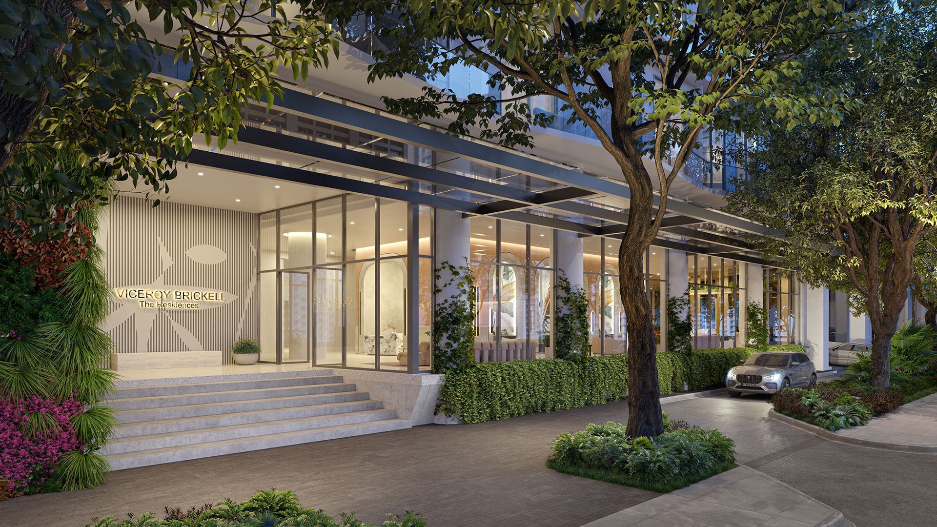 Viceroy Brickell The Residences in Brickell, Miami, luxury and ultra luxury preconstruction condos with a landscaped porte cochere arrival, canopy, glass facade, entry steps, and a car at the curb.
