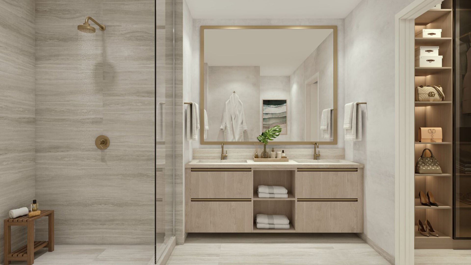 Viceroy Brickell The Residences in Brickell, Miami, luxury and ultra luxury preconstruction condos with a spa bathroom featuring a glass shower, double vanity, stone finishes, and an adjoining closet display.