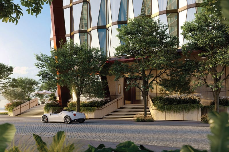 Villa Miami, Edgewater modern waterfront tower with porte‑cochère, palms and sports‑car arrival, iconic address of luxury and ultra luxury condos; preconstruction. Featuring building, exterior, and landscaping.
