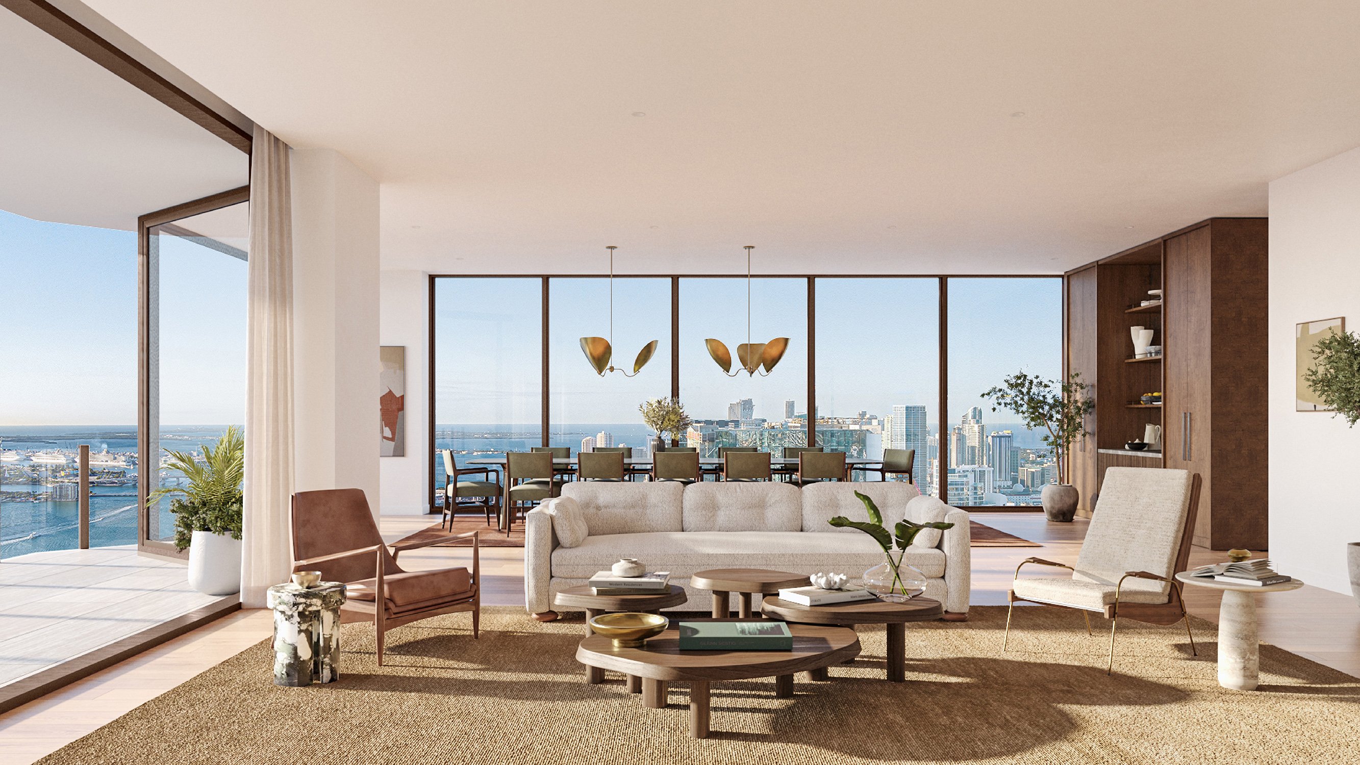 Villa Miami, Edgewater living room facing Miami skyline, balcony access and refined finishes—luxury and ultra luxury condos; preconstruction.