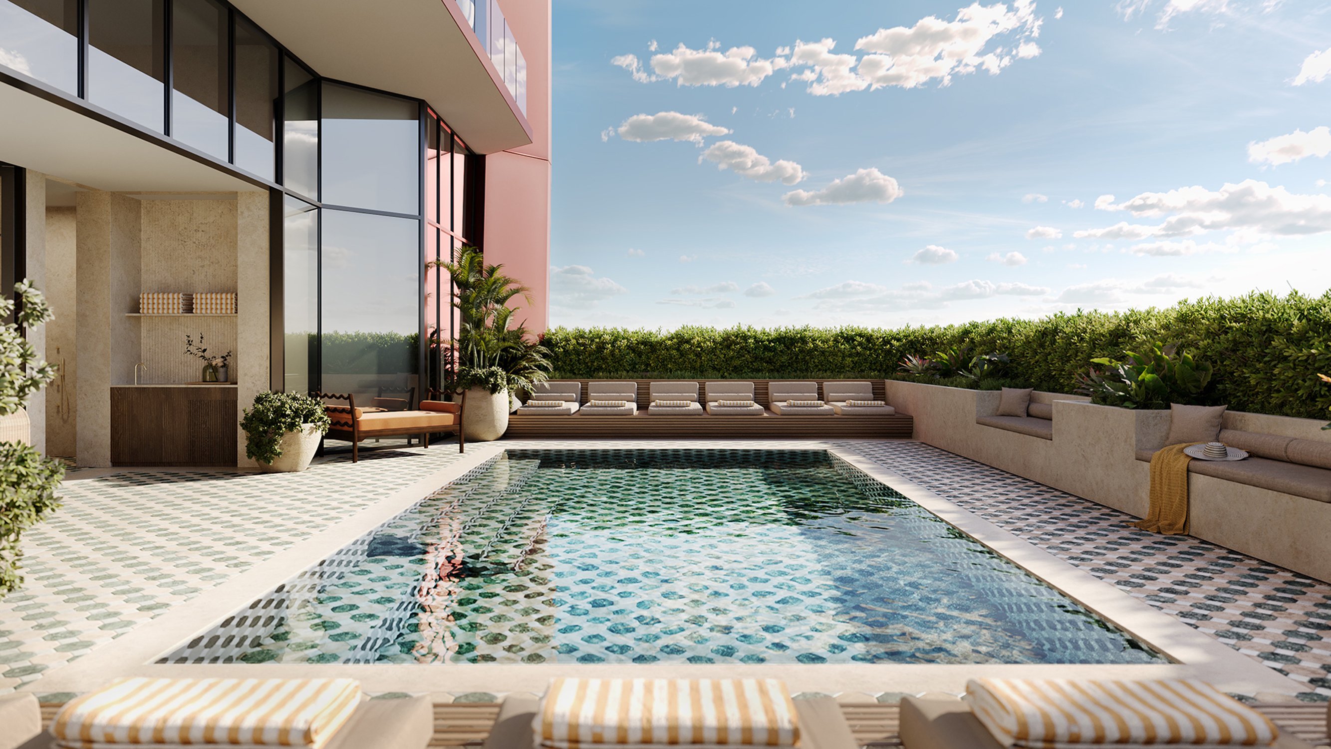 Villa Miami, Edgewater poolside patio scene with cabanas and skyline glimpses—bayfront lifestyle in luxury and ultra luxury condos; preconstruction.