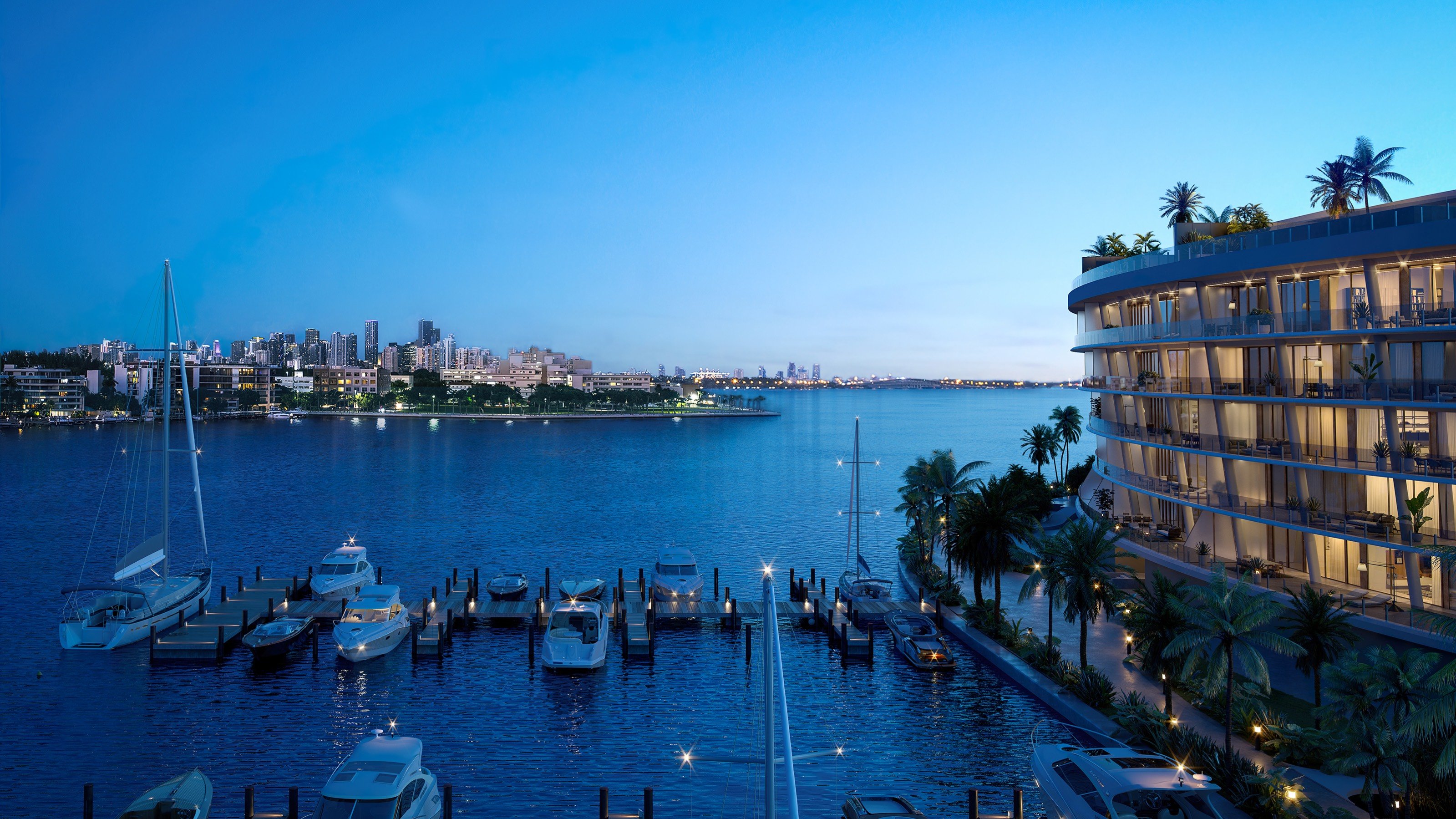 Vita at Grove Isle, Coconut Grove night skyline over marina and towers, private‑island luxury and ultra luxury condos; preconstruction. Featuring Miami, waterfront, view, and skyscrapers.