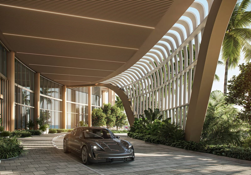 W Pompano Beach Residences entrance arrival with sports car, showcasing luxury and ultra luxury preconstruction condos lifestyle.
