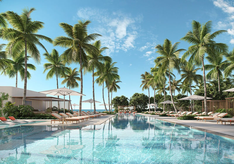 W Pompano Beach Residences tropical resort pool view, highlighting luxury and ultra luxury preconstruction condos lifestyle.