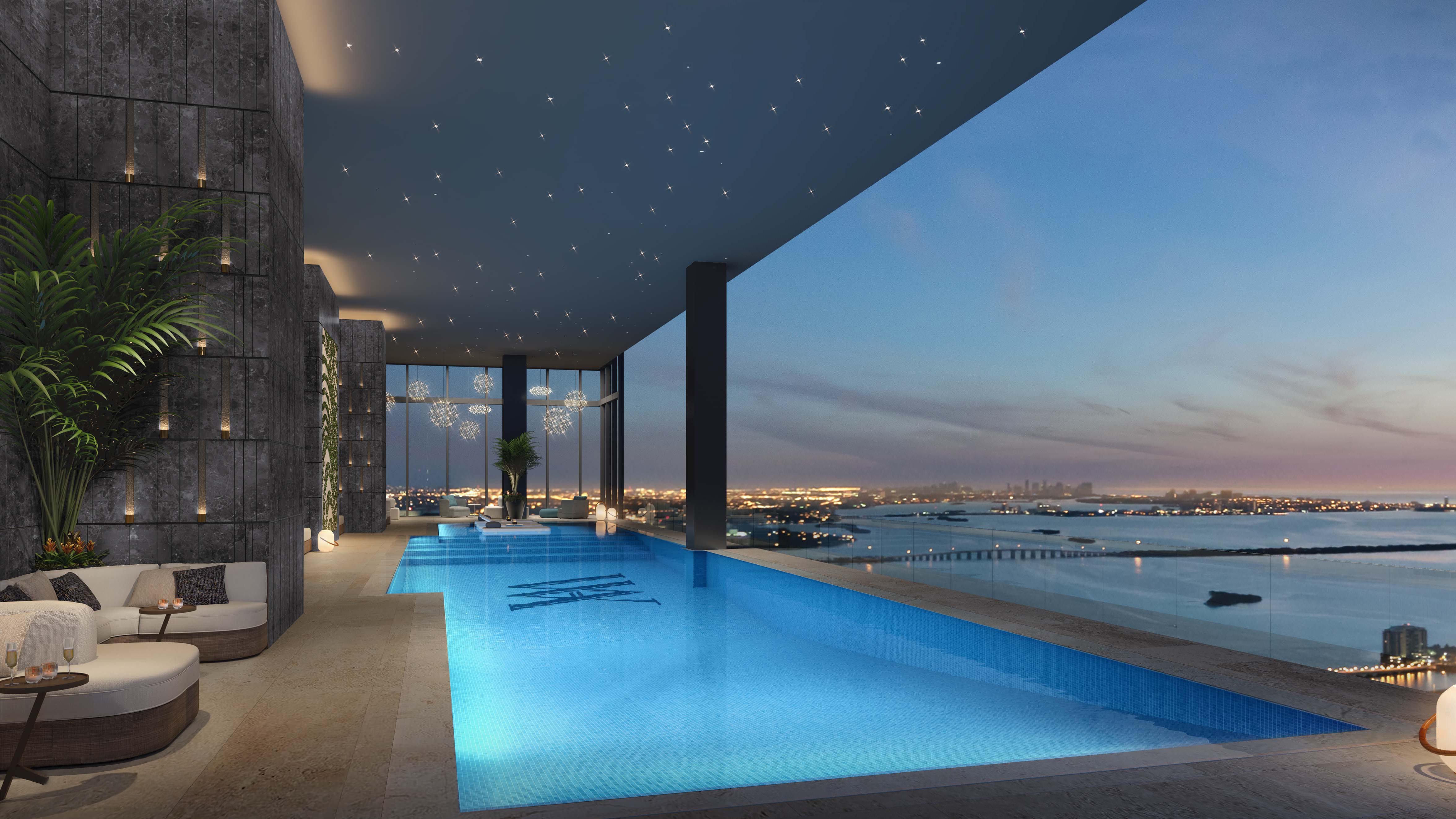 Waldorf Astoria Residences Miami, Downtown night infinity pool over the skyline—flagship luxury and ultra luxury condos; preconstruction.