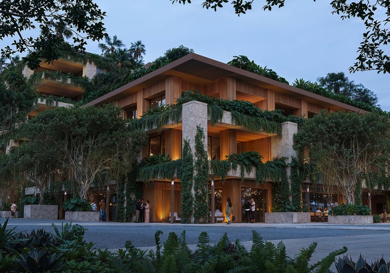 Vine-covered corner exterior at Ziggurat on Florida Ave and Matilda Street, Coconut Grove, Miami, Florida, at dusk, showcasing luxury street retail and ultra luxury preconstruction condos with warm architectural lighting.