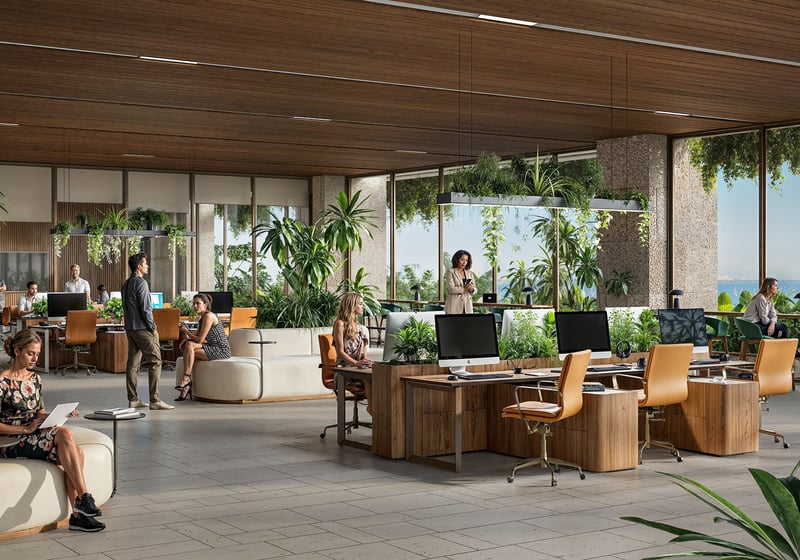 Biophilic open-plan office workspace at Ziggurat Coconut Grove, Miami, Florida, with floor-to-ceiling windows and ocean view, complementing luxury services and ultra luxury preconstruction condos in a mixed-use destination.