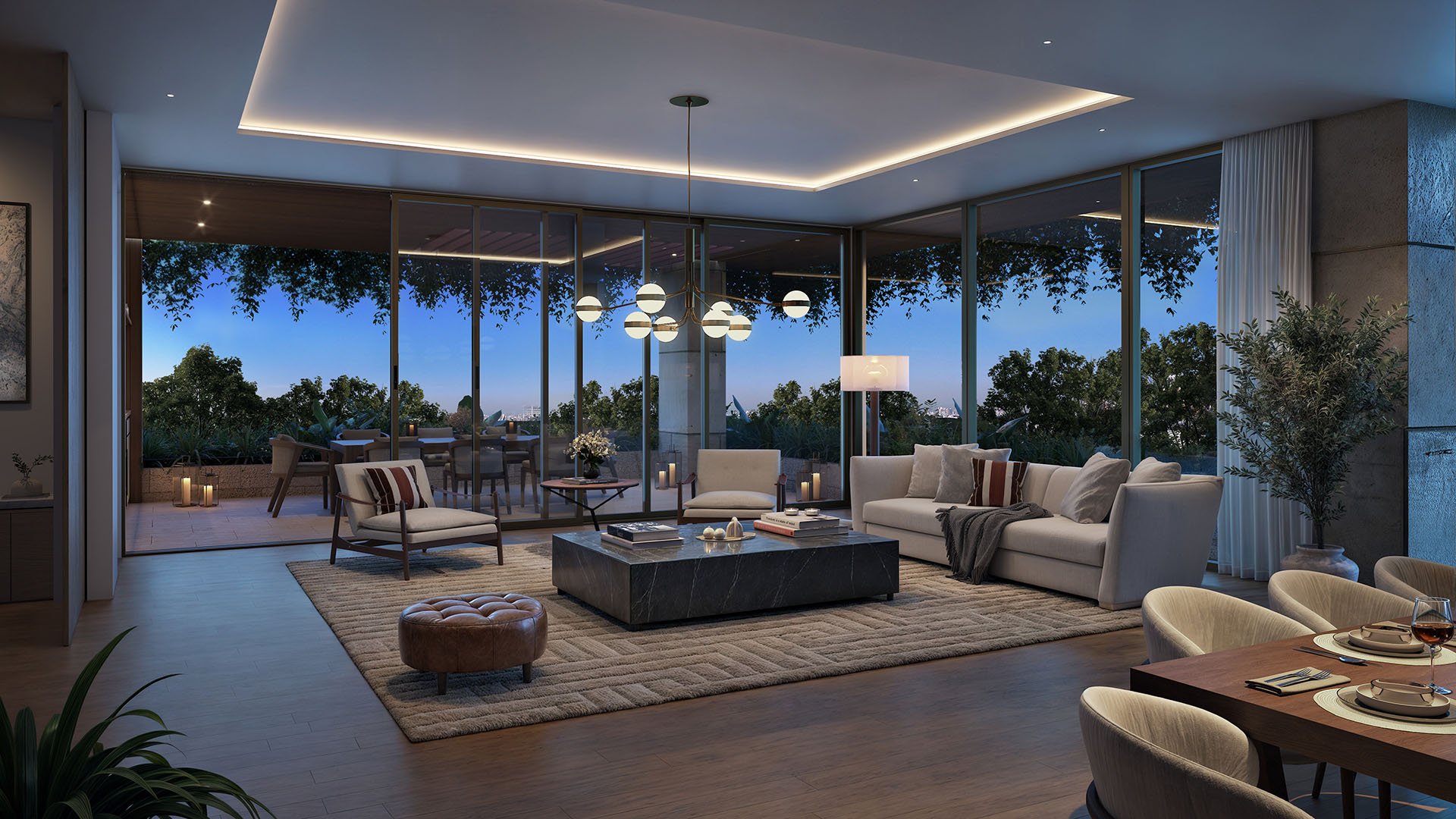 Penthouse living room at dusk at Ziggurat Coconut Grove, Miami, Florida, featuring floor-to-ceiling glass and terrace dining, showcasing luxury interiors and ultra luxury preconstruction condos with treetop views.