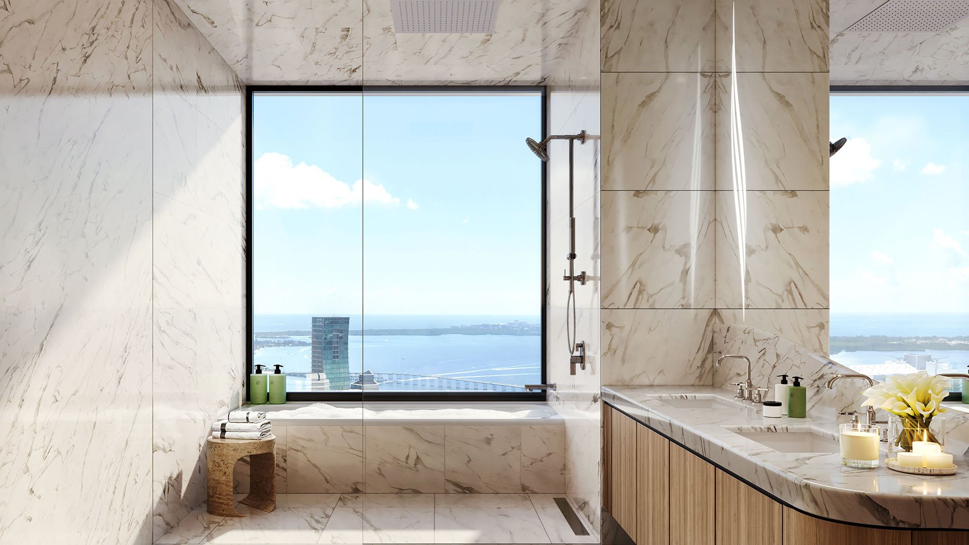 Mercedes-Benz Places Miami spa bathroom in Miami, Florida with marble-clad walls, glass shower and soaking tub by an ocean-view window, plus double vanity—signature luxury and ultra luxury preconstruction condos design.