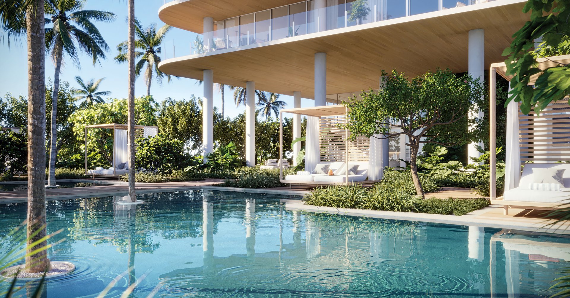 Ocean House Surfside is authored by Arquitectonica, the Miami studio founded by Bernardo Fort-Brescia and rooted in South Florida's architectural lineage. Interiors by Carla Guilhem draw from superyacht and private residence design, translating marine precision into organic materials and bespoke finish. ArquitectonicaGEO extends the composition through tropical gardens, reflecting ponds, and the passage from dunes to oceanfront lawn.