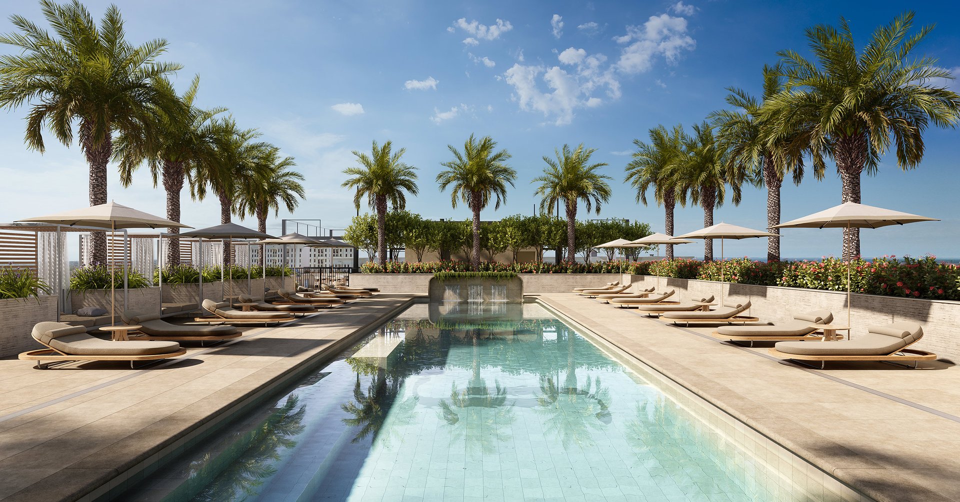 This luxurious rooftop pool area features a sun shelf for lounging and dedicated private cabanas. The area provides a perfect setting for relaxation, sunbathing, and enjoying the beautiful Coral Gables weather in style.