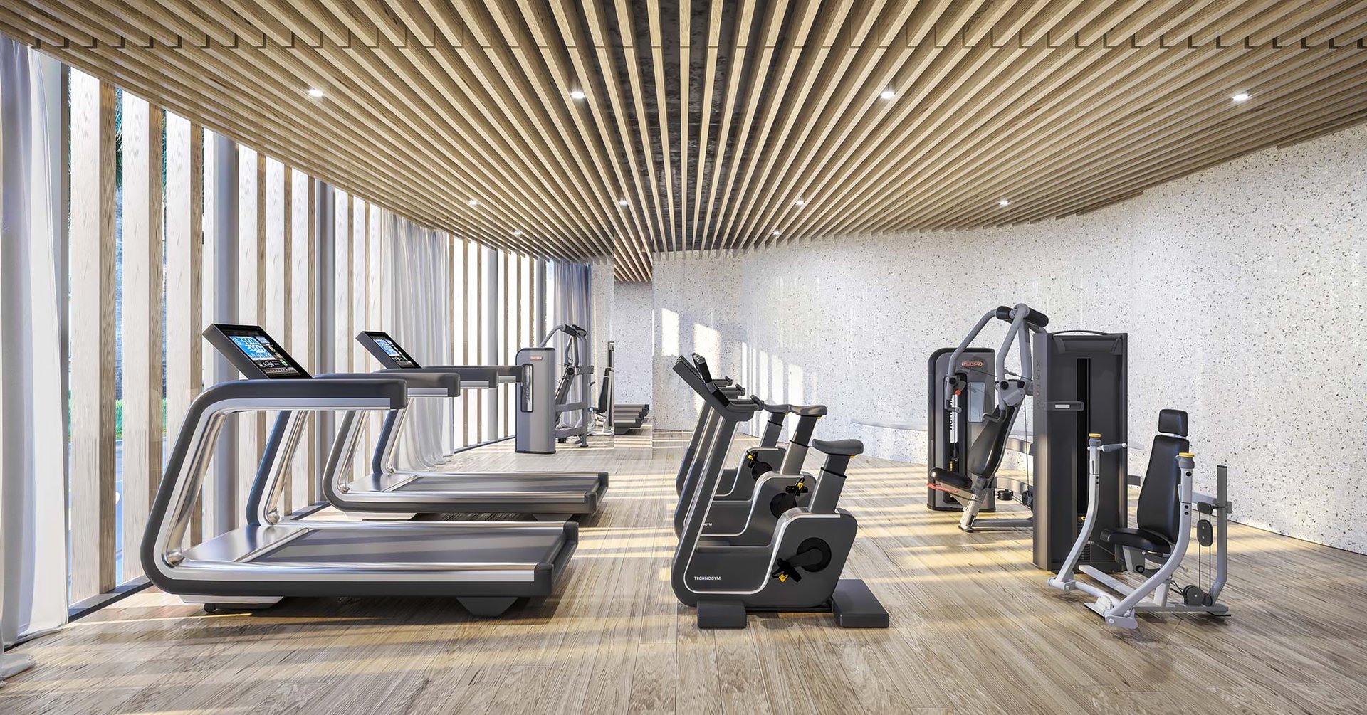 This wellness facility includes a state-of-the-art fitness center with Technogym cardio & strength equipment, sauna and steam bath, indoor yoga studio, treatment room and changing rooms.