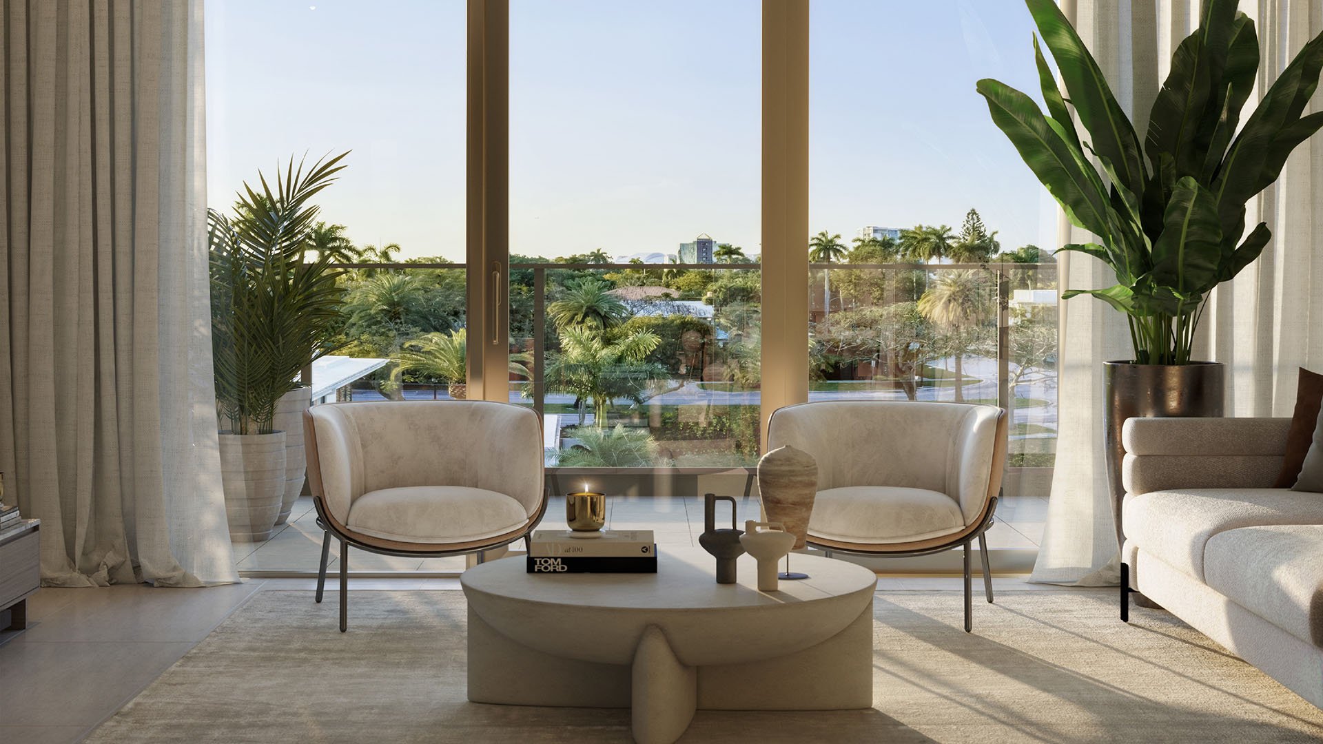 2200 Brickell in Brickell, Miami, Florida living room seating by sliding glass doors and balcony, overlooking lush tropical gardens, promoting luxury and ultra luxury preconstruction condos with indoor-outdoor lifestyle.