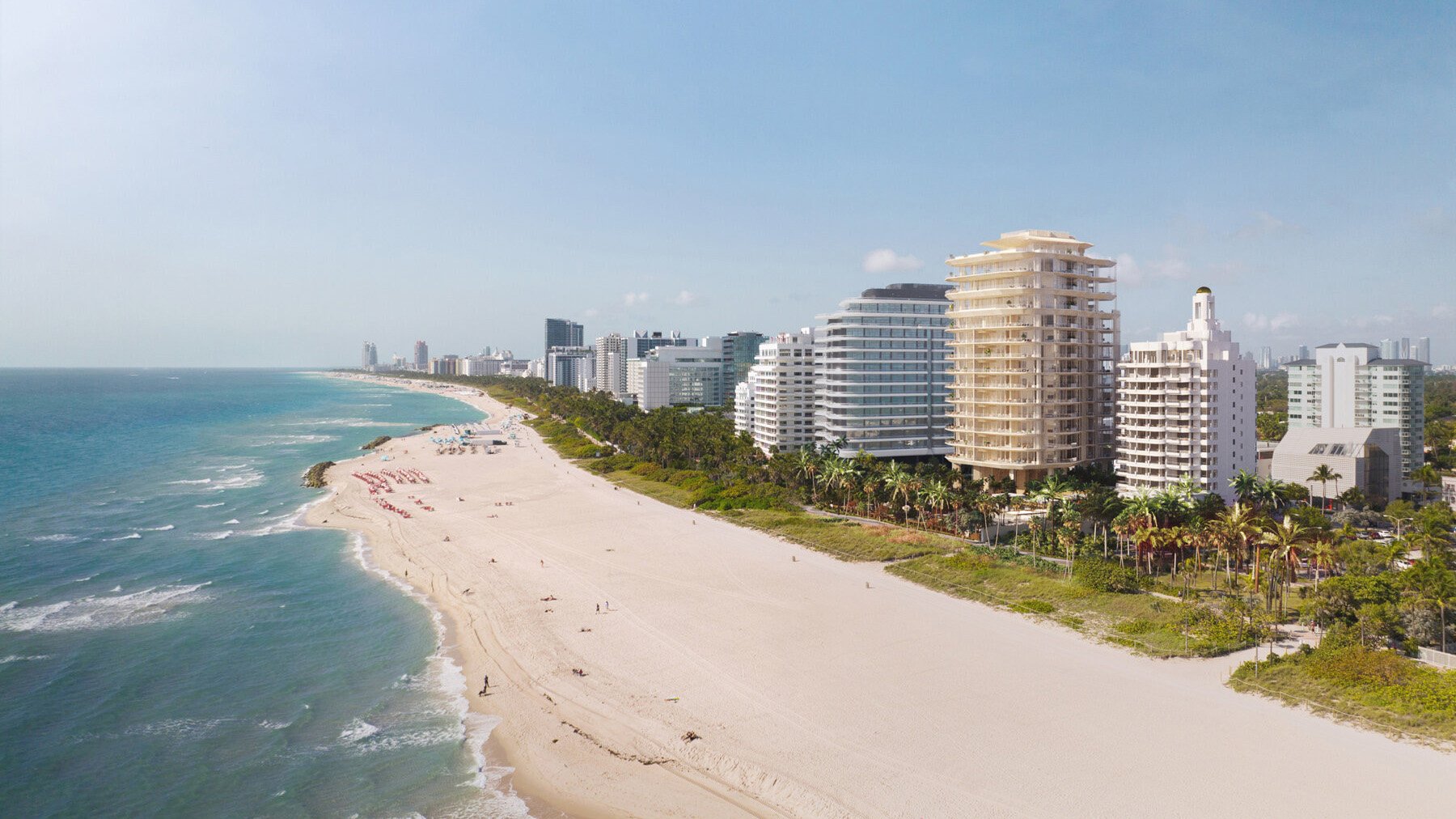 Aman Residences Miami Beach luxury oceanfront condos rising over the sand, featuring ultra luxury preconstruction highrise design with sweeping Atlantic and Miami Beach skyline views.