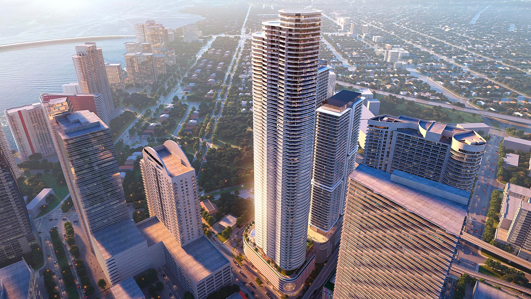 Cipriani Residences Brickell, Miami modern skyscraper cityscape over Biscayne Bay - financial district address offering luxury and ultra luxury condos; prime preconstruction in Brickell.