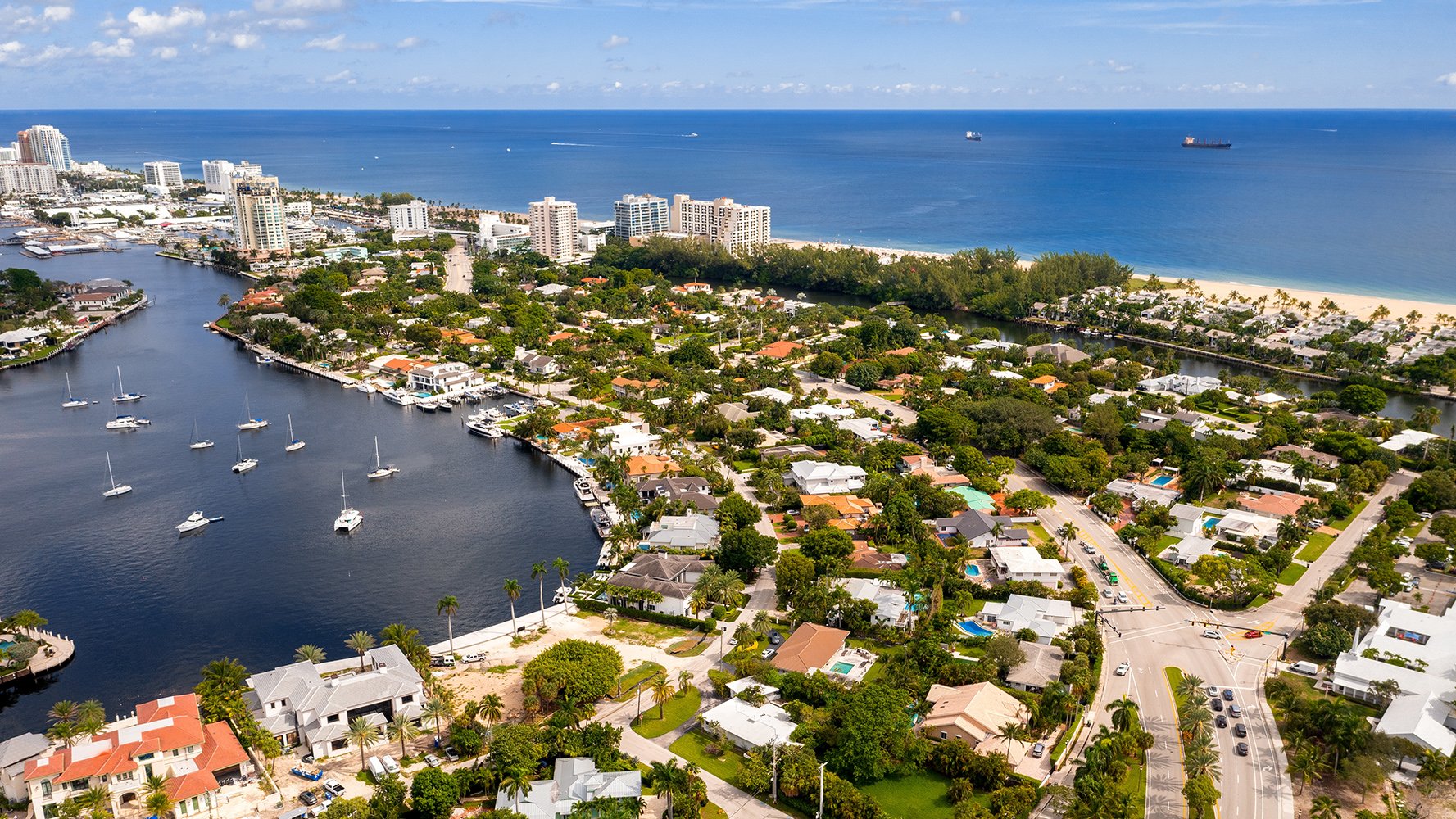 Fort Lauderdale, Florida aerial of coastal homes, canals and beaches—yachting capital with luxury and ultra luxury condos; active preconstruction and resale.