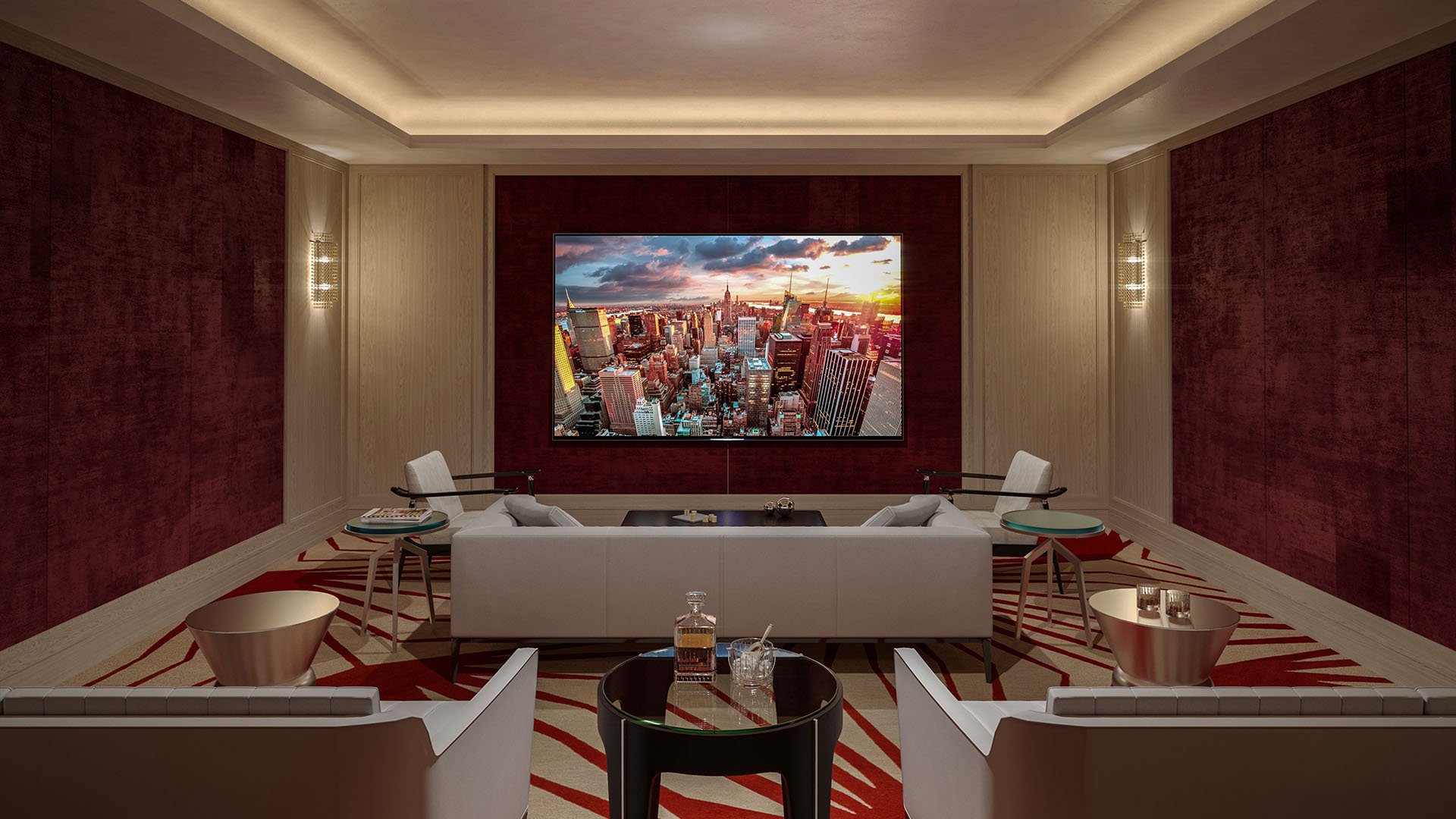 Palazzo della Luna in Fisher Island luxury and ultra luxury condos with a media room, red accent walls, lounge seating, and a large screening display.