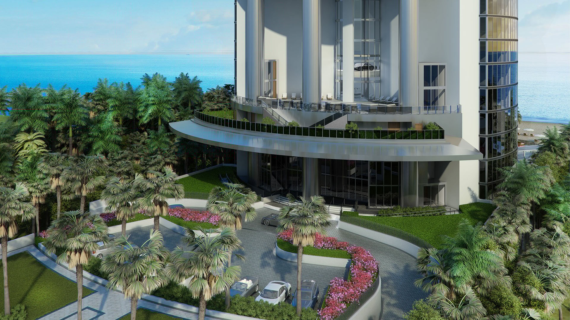 Porsche Design Tower Sunny Isles Beach luxury ultra luxury condos with a grand curved exterior entrance, tropical landscaping, porte cochere driveway, and oceanfront setting in Sunny Isles Beach.