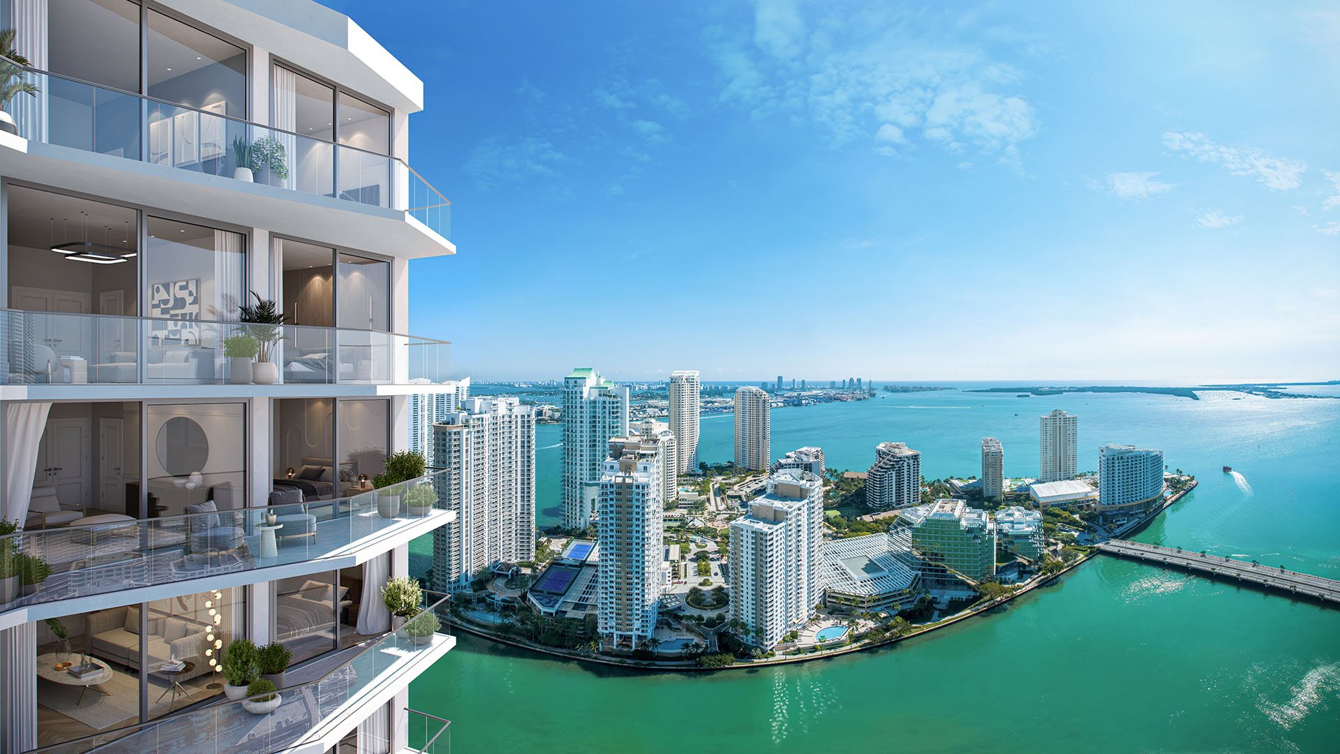 Viceroy Brickell The Residences in Brickell, Miami, luxury and ultra luxury preconstruction condos with corner balconies overlooking turquoise bayfront water, nearby towers, and a sweeping aerial skyline view.