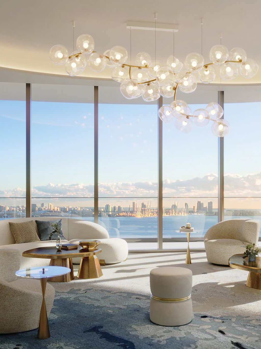 Occupying the summit of The St. Regis Residences, Miami, Upper Penthouse spans roughly 10,000 interior square feet across three private levels above South Brickell’s bayfront edge. Robert A.M. Stern Architects and Rockwell Group shape the residence with the composed scale of a waterfront estate. From this elevation, Biscayne Bay, the Atlantic horizon, and the Miami skyline unfold in a continuous register.