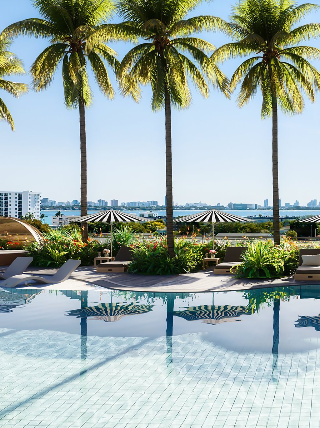 The exclusive members-only social club boasts a vibrant community atmosphere, featuring two enticing pools, a rejuvenating spa, a state-of-the-art golf simulator, and a riveting virtual gaming room.