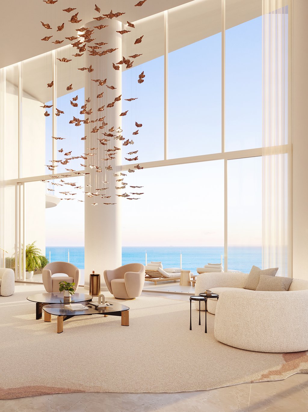 Set atop the tower's uppermost levels, the penthouse brings Kobi Karp's oceanfront architecture into dialogue with interiors by Alessandro Munge of Studio Munge. Floor-to-ceiling glazing and wraparound terraces open long views across the Atlantic Ocean, Miami Beach, Biscayne Bay, and the skyline beyond. Above the shoreline, it reads less as a residence than as a private house suspended in the sky.