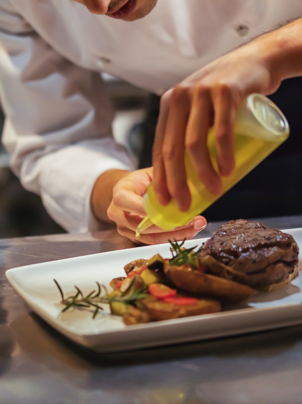 Indulge in culinary excellence at The Delmore's private restaurant. Featuring a Michelin-starred menu, this exclusive dining destination is reserved for residents and their guests.