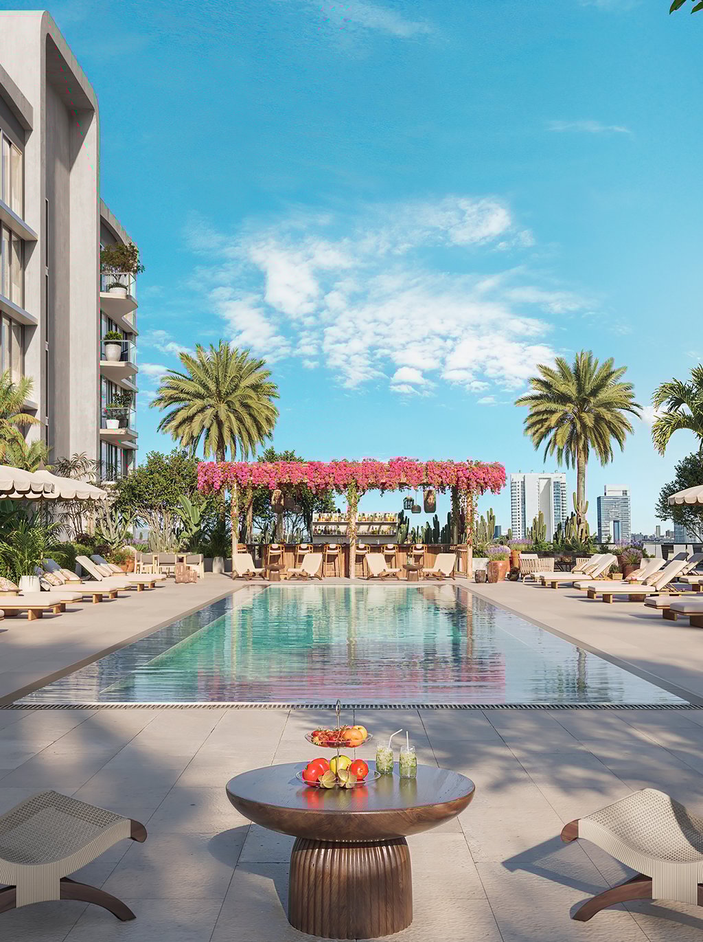 The elevated amenity deck centers on a resort-style pool with skyline views, shaded lounges, private cabanas, and lush landscaping inspired by Frida Kahlo's garden. A modern fitness studio and thermal circuit with sauna, steam, and cold plunge support both energy and restoration.