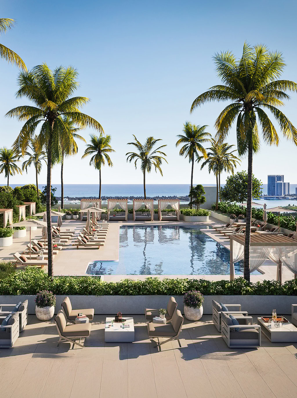 The expansive social deck features a pool and poolside summer kitchen, children’s play zone, dog-walking trails, and playgrounds with professional tennis and pickleball courts.