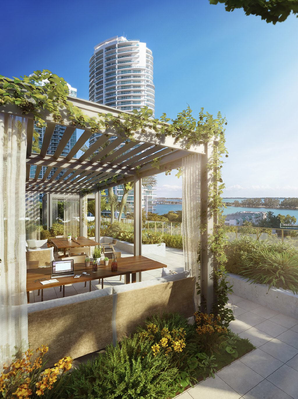 The sun-drenched lush landscape of 2200 Brickell’s rooftop terrace is an exquisitely elevated experience spanning close to one acre of relaxing areas.